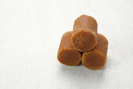 Cylindrical Brown palm sugar, food ingredientの写真素材