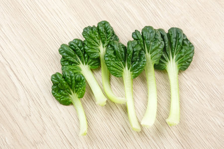 Sawi Pagoda (Tatsoi) served on rattan basket, food ingredientの写真素材