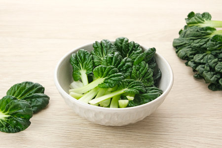 Sawi Pagoda (Tatsoi) served on rattan basket, food ingredientの写真素材