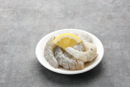 Fresh peeled shrimps (udang kupas), food preparation.の写真素材
