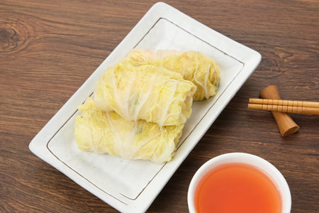 Rolled Chinese cabbage (Sawi Gulung Tahu) with tofu and chilli sauce