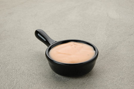 Bowl of tasty mayonnaise, copy space