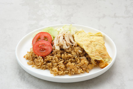 Nasi Goreng Telur Dadar, popular traditional Indonesian street foodの写真素材