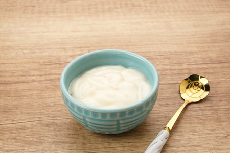 Fresh Healthy Plain Yogurt in a small bowlの写真素材