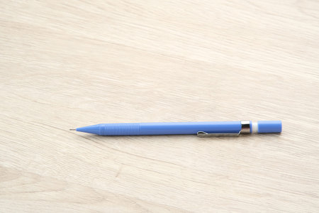 Purple Plastic Mechanical Pencil on the tableの写真素材
