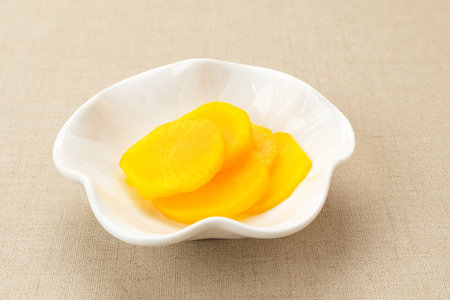 Danmuji, yellow pickled radish, traditional Korean Foodの写真素材