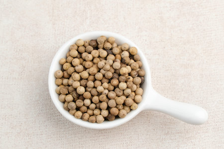 Aromatic and fresh white pepper on small bowl