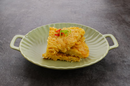 Martabak Mie, made from noodles mixed with eggs, leeks then fried. Indonesian foodの写真素材