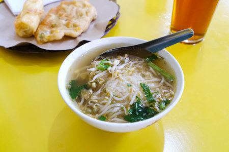 Bowl of Soto Daging or Beef Soup with Bean Sproutsの写真素材