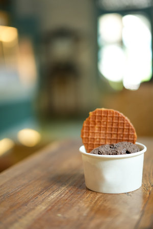 Ice cream in paper cup, blurred backgroundの写真素材