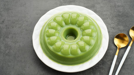 Matcha pudding dessert on white plateの写真素材