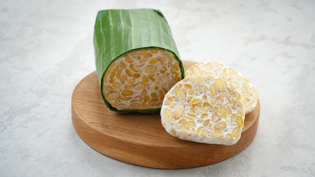 Raw Tempeh or Tempe, Indonesian traditional food, made from fermented soybeans.の写真素材
