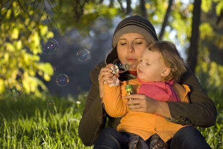 Mother and the daughter play parkの写真素材