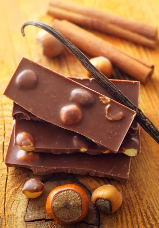 Chocolate and aroma spice on the wooden boardの写真素材