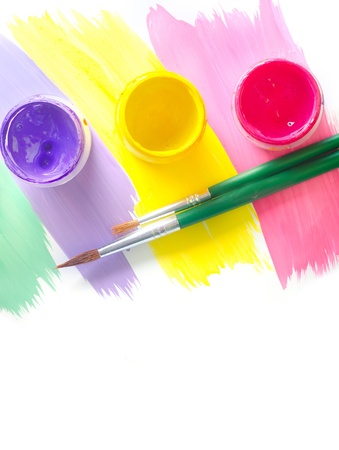Color paints and brushes isolation on white backgroundの写真素材
