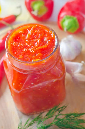 Fresh chilli sauce in the glass bankの写真素材