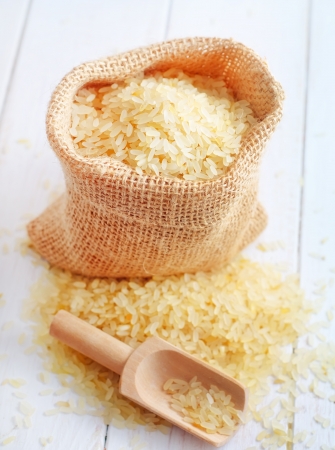 Raw rice on the table, portion of the raw riceの写真素材