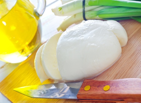 fresh mozzarella on the wooden boardの写真素材