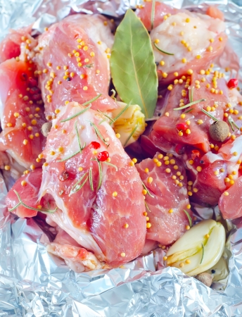 raw meat in the foilの写真素材