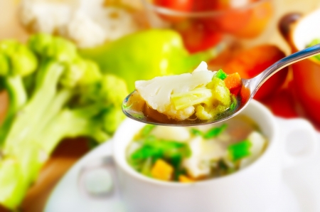 fresh soup in the spoonの写真素材