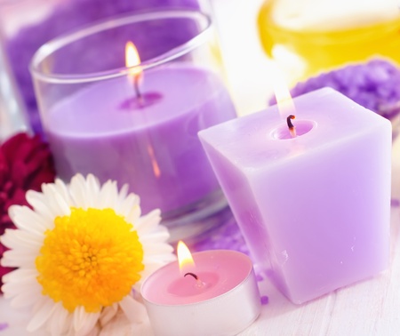 Sea salt and candle, color saltの写真素材