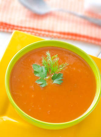 Fresh soup from pumpkin in the green bowlの写真素材