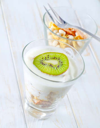 fresh yogurt and muesli in a glassの写真素材