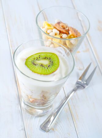 fresh yogurt and muesli in a glassの写真素材
