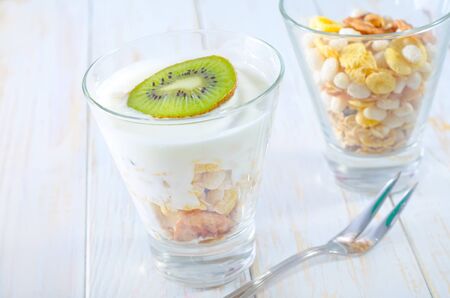 fresh yogurt and muesli in a glassの写真素材