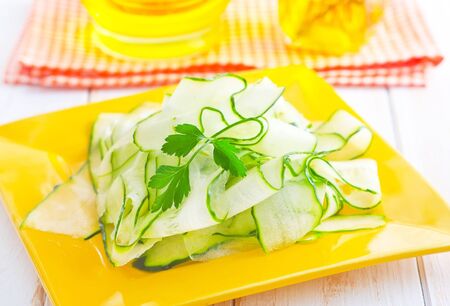 Fresh salad with fresh cucumber and parsleyの写真素材