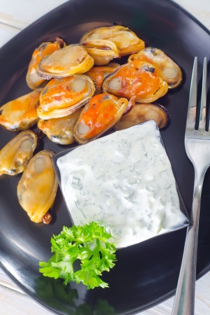 mussels with sauceの写真素材