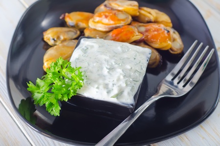 mussels with sauceの写真素材