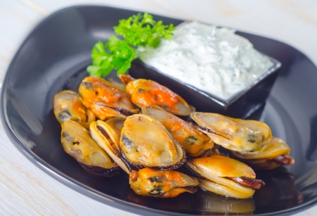 mussels with sauceの写真素材