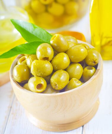 green olives and oilの写真素材