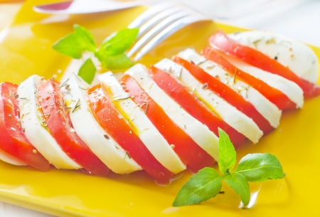 caprese, fresh salad with tomato and mozzarellaの写真素材