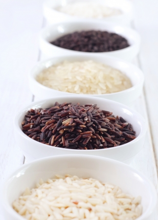 Different kind of raw rice, raw rice in the white bowlsの写真素材