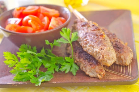 kebab with fresh tomatoの写真素材