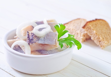 herring with onion and breadの写真素材