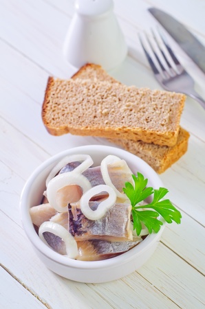 herring with onion and breadの写真素材