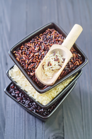 raw rice in bowlsの写真素材