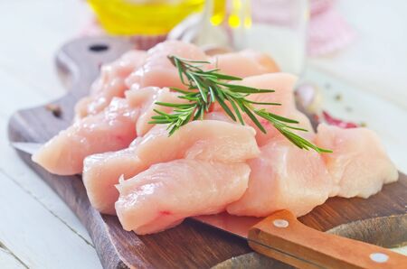 chicken on boardの写真素材