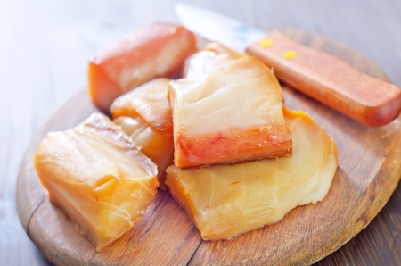 smoked fish on boardの写真素材