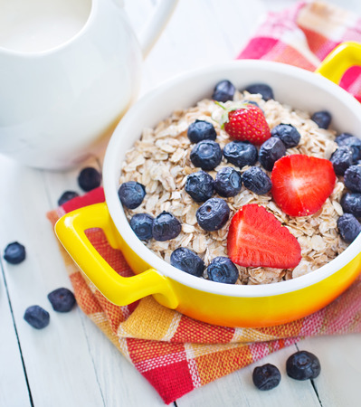 oat flakes with berriesの写真素材