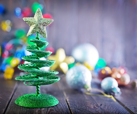 christmas tree and christmas decoration on a tableの写真素材