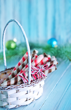 Christmas candy, Christmas treats and a branch of the Christmas treeの写真素材