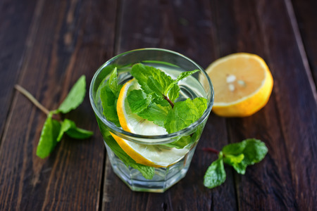 fresh lemon drink with sugar and mintの写真素材