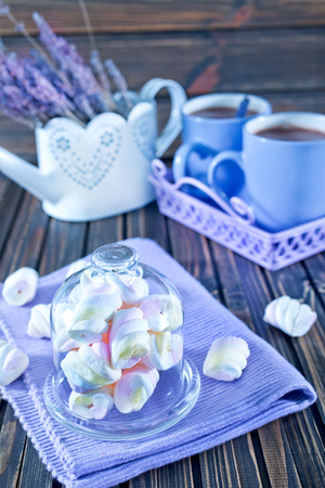 cmarshmallows in bowl and on a tableの写真素材