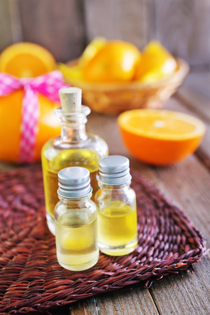 aroma oil in bottles on a tableの写真素材