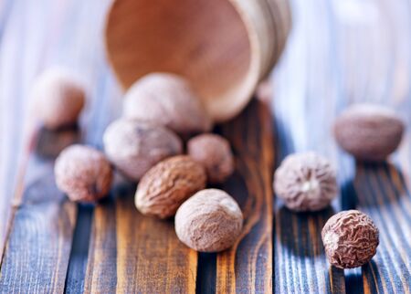 nutmeg on a tableの写真素材