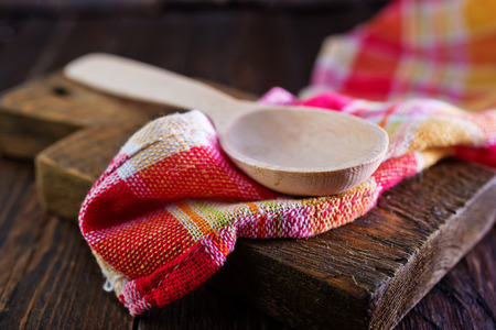 wooden spoon on boardの写真素材